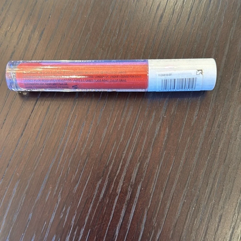 New! Revolution Obsession Lip Gloss Disorderly